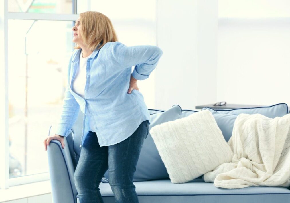 woman with back pain woman with back pain